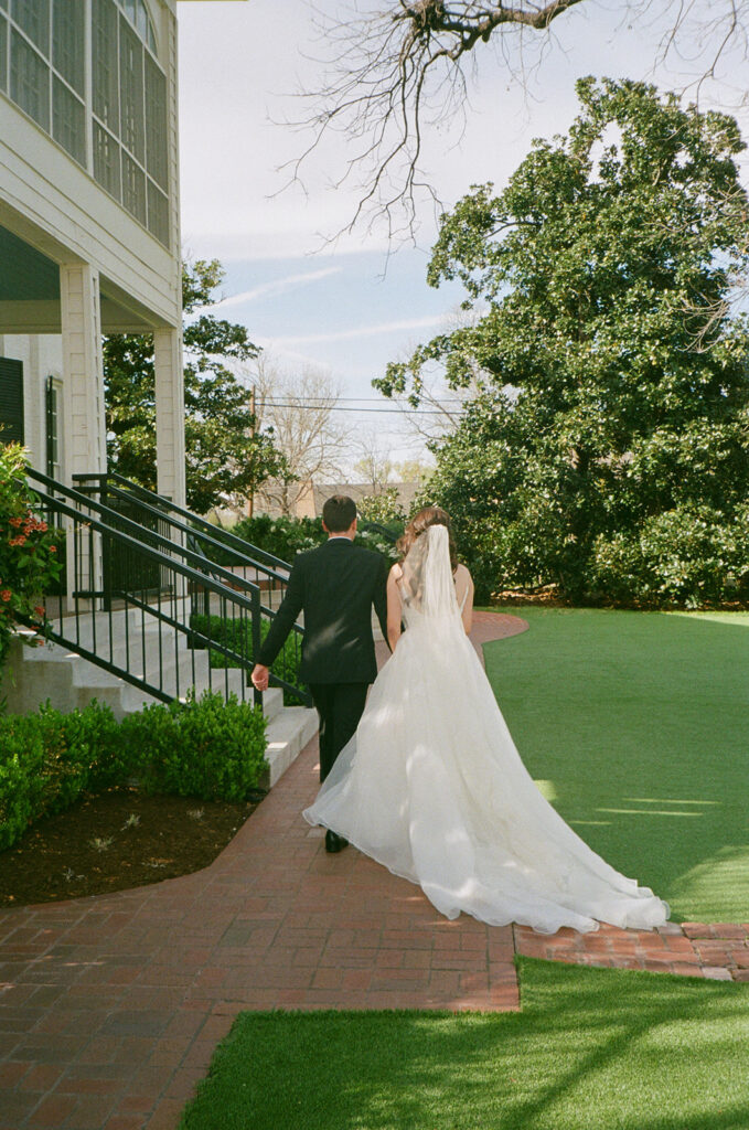 35mm film documentary style and candid wedding at a austin texas venue, woodbine mansion by a documentary film wedding photographer 