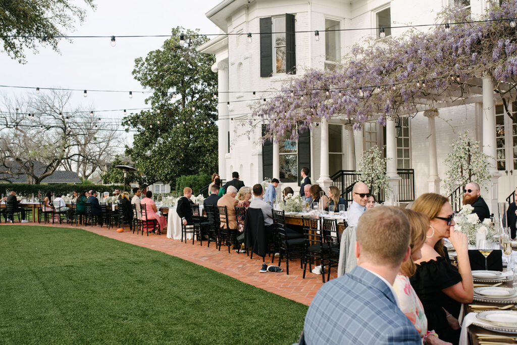 candid approach to a wedding in austin texas at woodbine mansion by a documentary wedding photographer