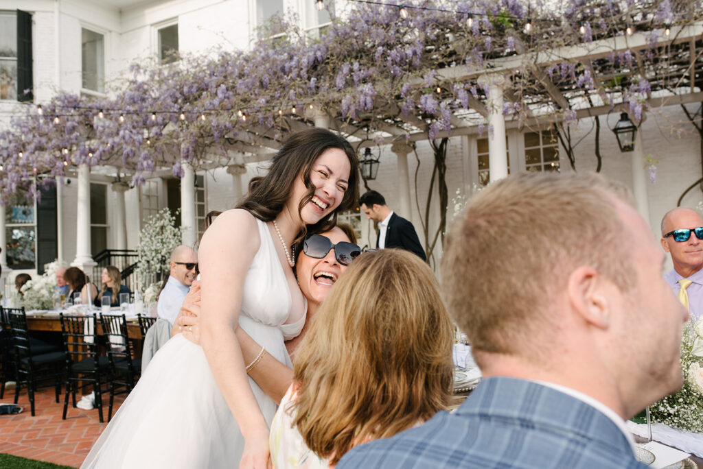 candid approach to a wedding in austin texas at woodbine mansion by a documentary wedding photographer