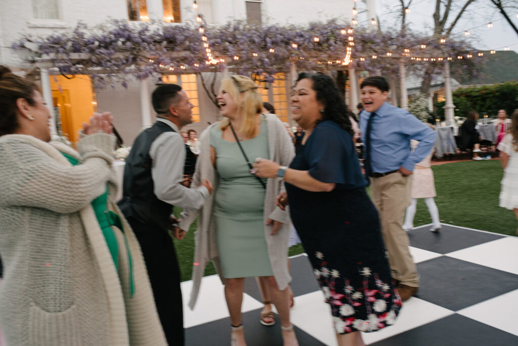 candid approach to a wedding in austin texas at woodbine mansion by a documentary wedding photographer