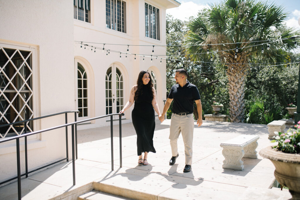 Candid, fun, documentary engagement photo at Laguna Gloria, top six engagement session location in austin texas.