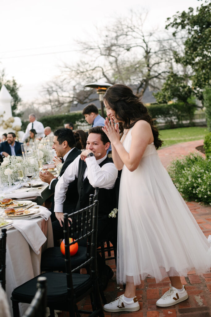 candid approach to a wedding in austin texas at woodbine mansion by a documentary wedding photographer