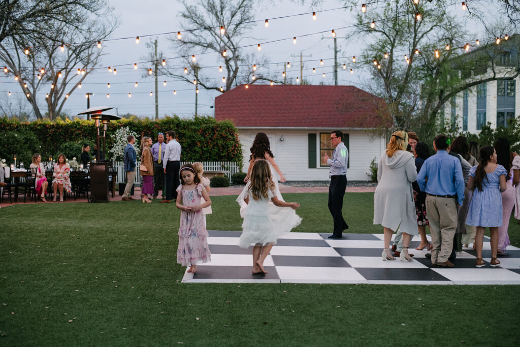 candid approach to a wedding in austin texas at woodbine mansion by a documentary wedding photographer