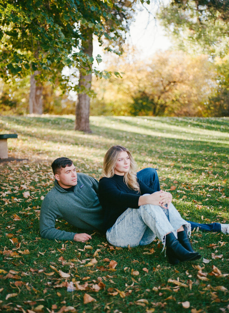 35mm film engagement session in Denver Colorado - couple laughing during golden hour