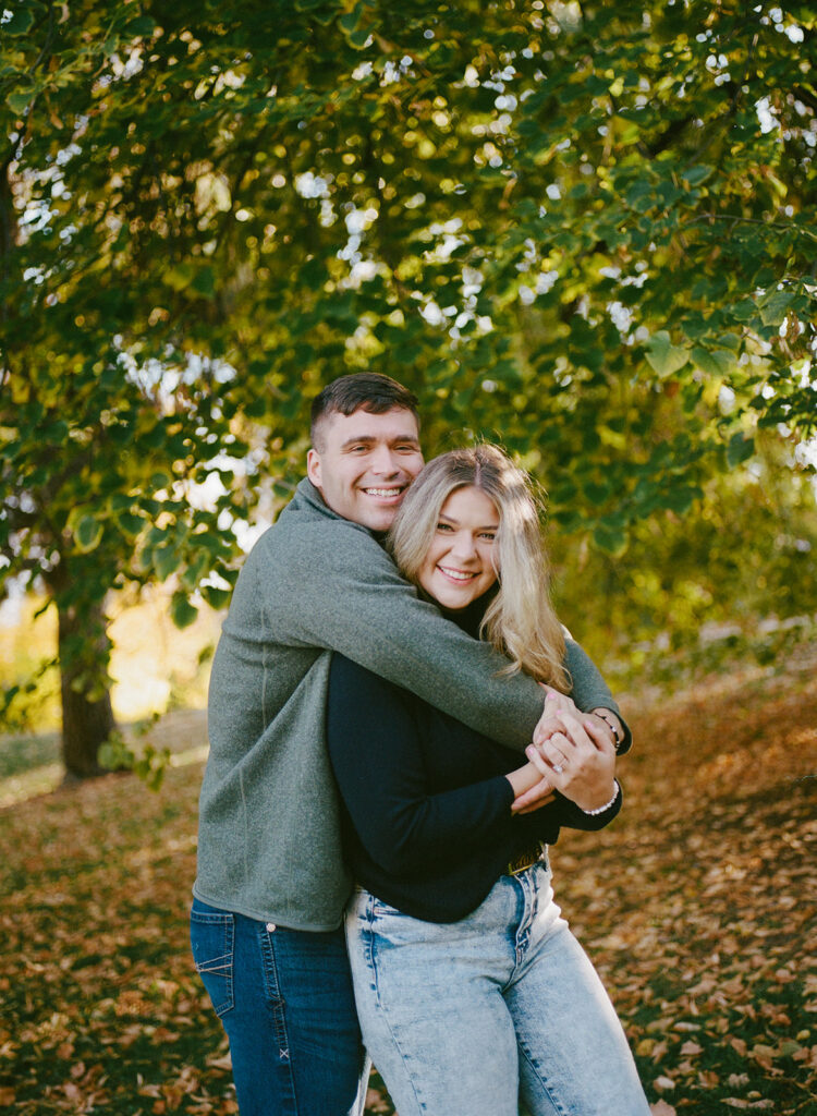 Denver engagement photographer capturing couple on film - candid and nostalgic memories