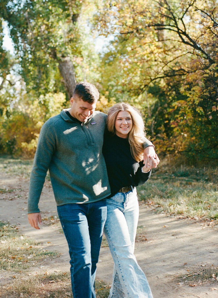 Denver engagement photographer capturing couple on film - candid and nostalgic memories