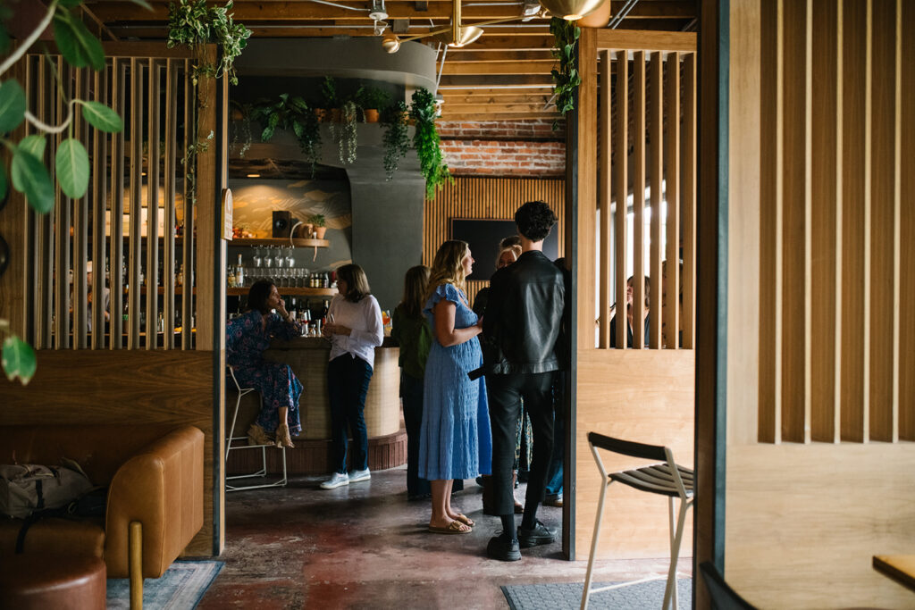 Romantic moment during a surprise proposal and engagement at My Bony Tony in Denver, Colorado