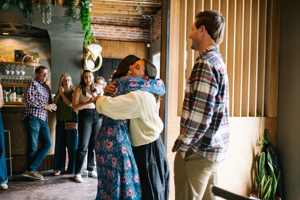 Romantic moment during a surprise proposal and engagement at My Bony Tony in Denver, Colorado