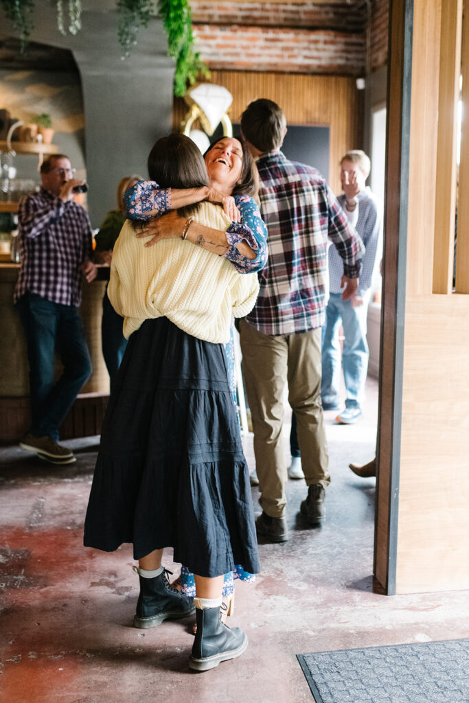 Romantic moment during a surprise proposal and engagement at My Bony Tony in Denver, Colorado