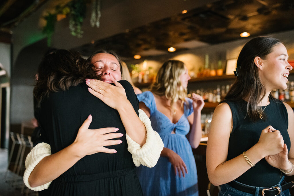 Romantic moment during a surprise proposal and engagement at My Bony Tony in Denver, Colorado