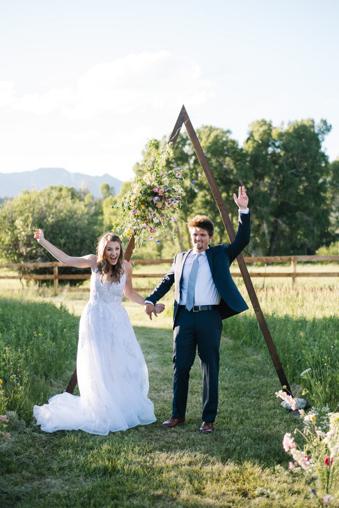 Wedding ceremony with mountain views at Shaw River Ranch wedding venue in Salida, Colorado, 