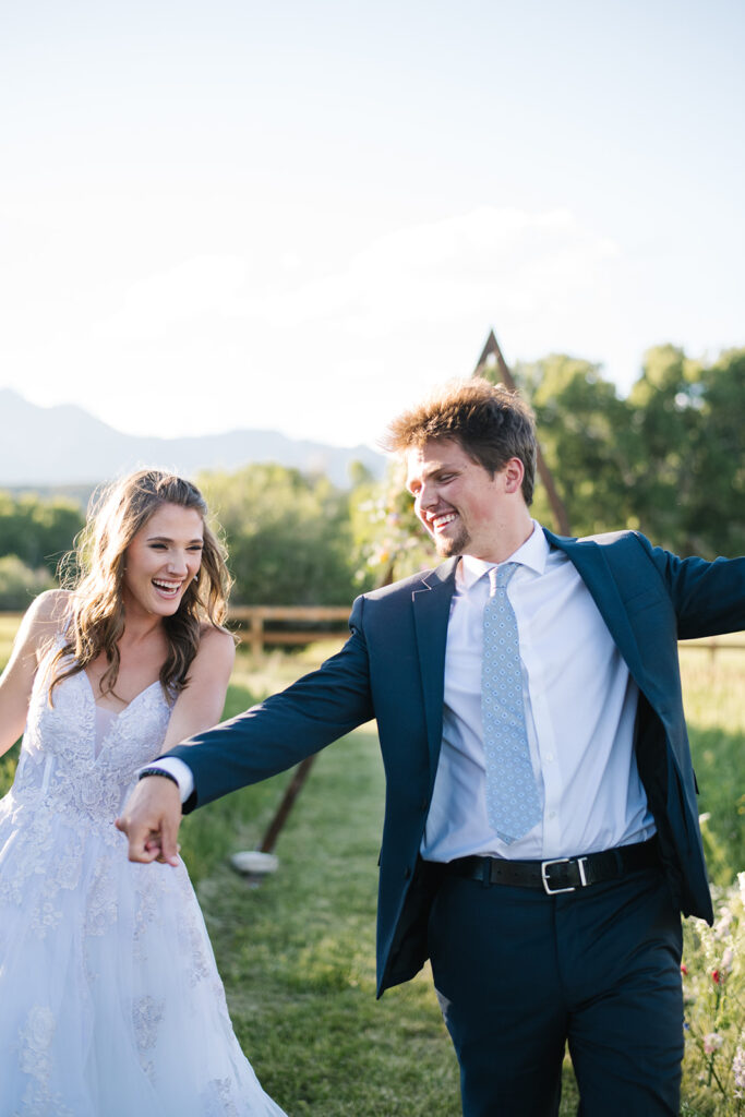 Wedding ceremony with mountain views at Shaw River Ranch wedding venue in Salida, Colorado, 