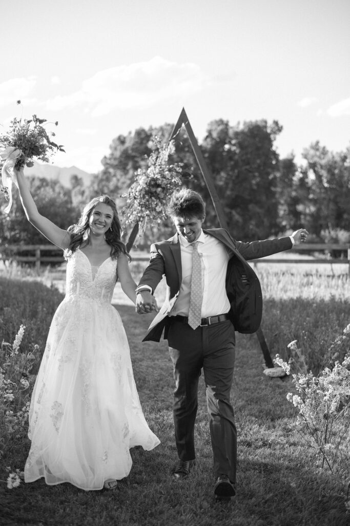 Wedding ceremony with mountain views at Shaw River Ranch wedding venue in Salida, Colorado, 