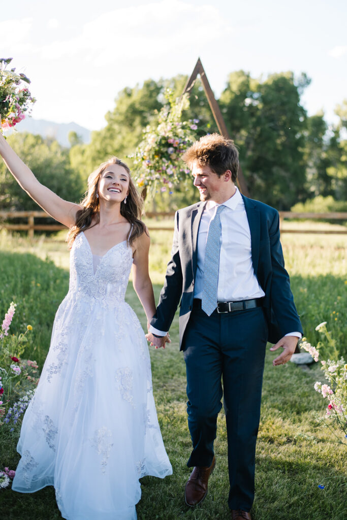 Wedding ceremony with mountain views at Shaw River Ranch wedding venue in Salida, Colorado, 