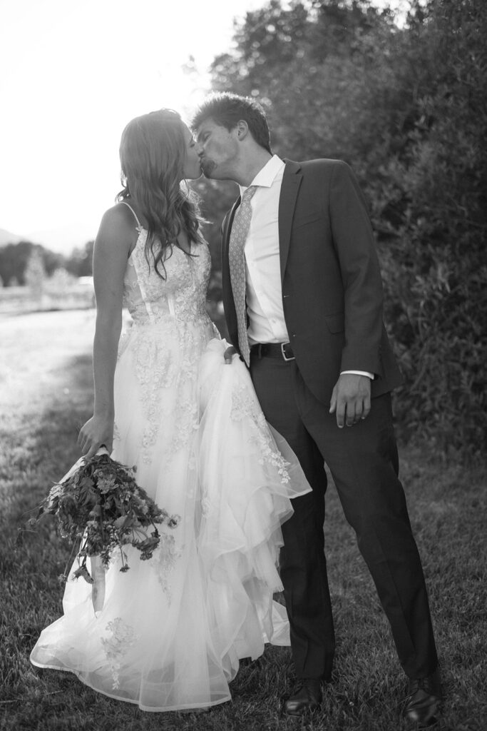 Wedding ceremony with mountain views at Shaw River Ranch wedding venue in Salida, Colorado, 