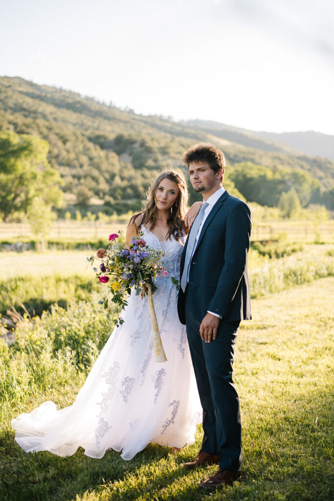 Wedding ceremony with mountain views at Shaw River Ranch wedding venue in Salida, Colorado, 