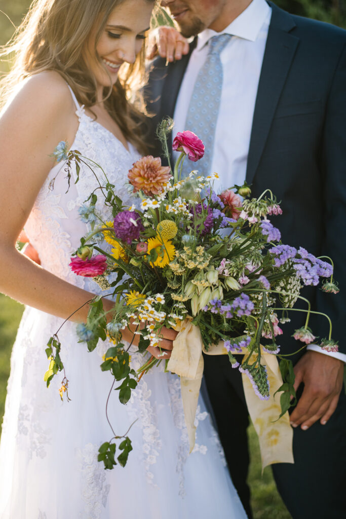 Wedding ceremony with mountain views at Shaw River Ranch wedding venue in Salida, Colorado, 