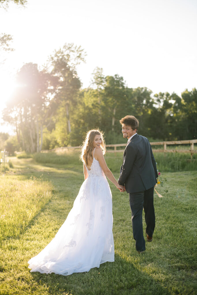 Wedding ceremony with mountain views at Shaw River Ranch wedding venue in Salida, Colorado, 