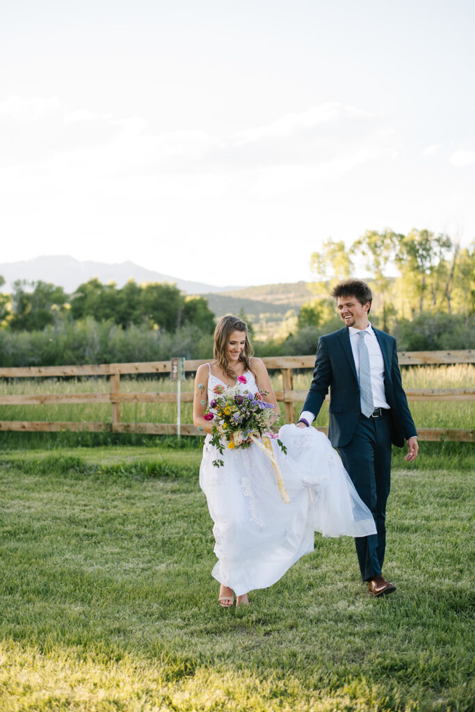 Wedding ceremony with mountain views at Shaw River Ranch wedding venue in Salida, Colorado, 