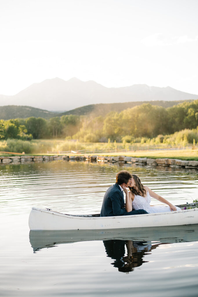 Wedding ceremony with mountain views at Shaw River Ranch wedding venue in Salida, Colorado, 