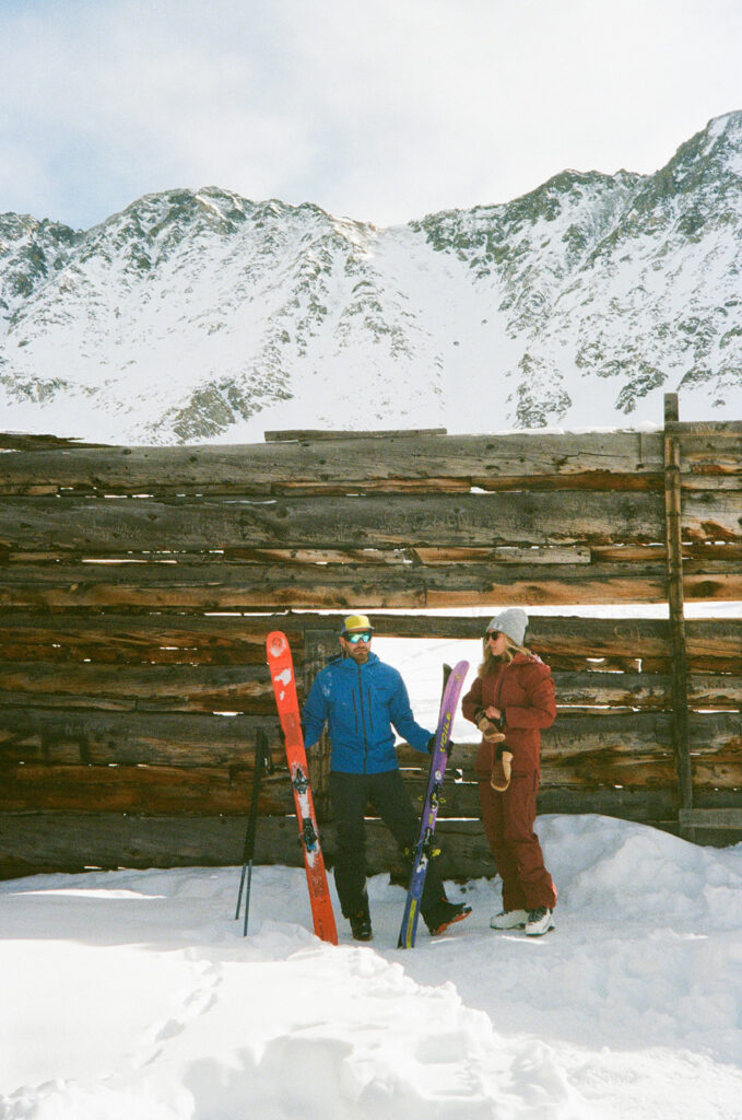 Couple during a snowy winter engagement session in Colorado’s Rocky Mountains.