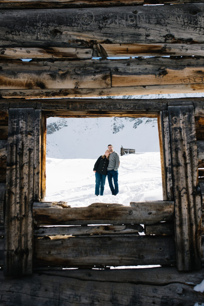 Colorado winter engagement session with a couple in the snow.
