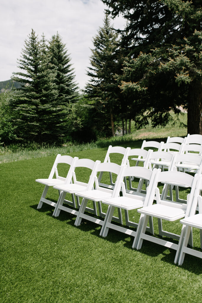 Outdoor wedding ceremony site at Wedgewood Mountain View Ranch in Pine, CO with mountain views and a rustic wooden arbor.