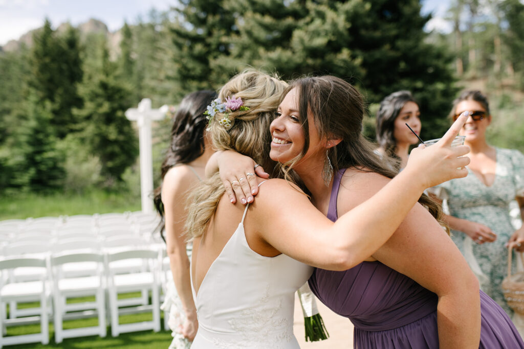 Bride and groom chatting with guests during cocktail hour at Wedgewood Mountain View Ranch wedding.