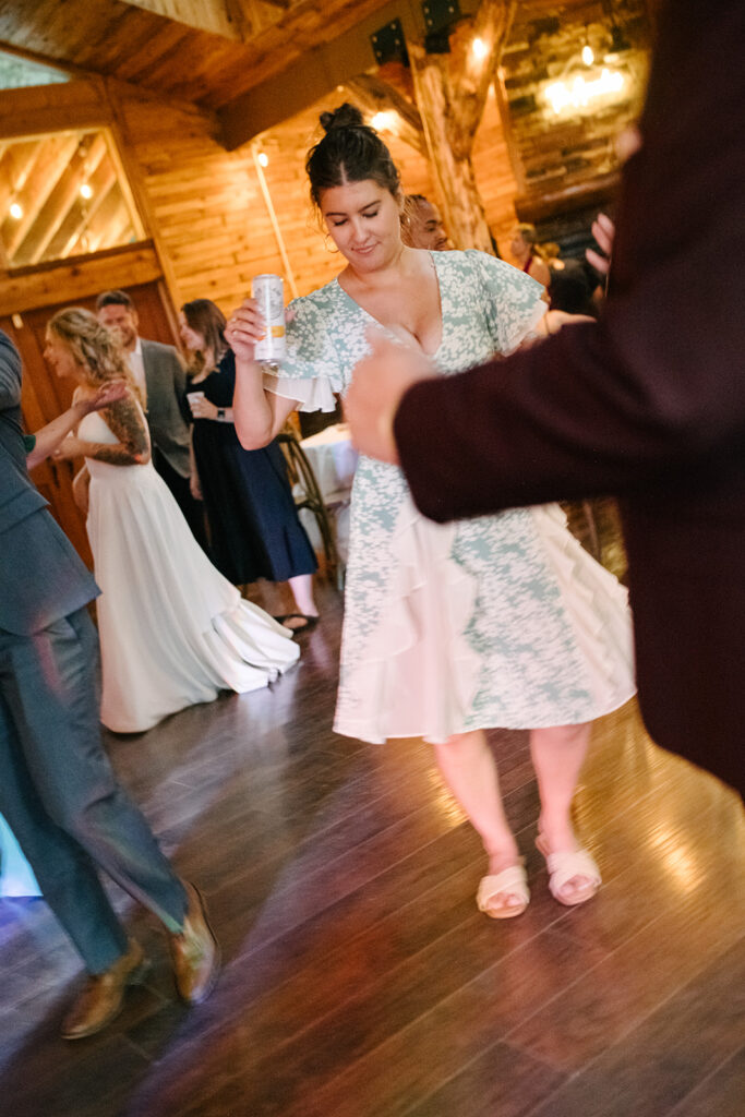 Late night dancing inside Wedgewood Mountain View Ranch’s lodge-style reception space.