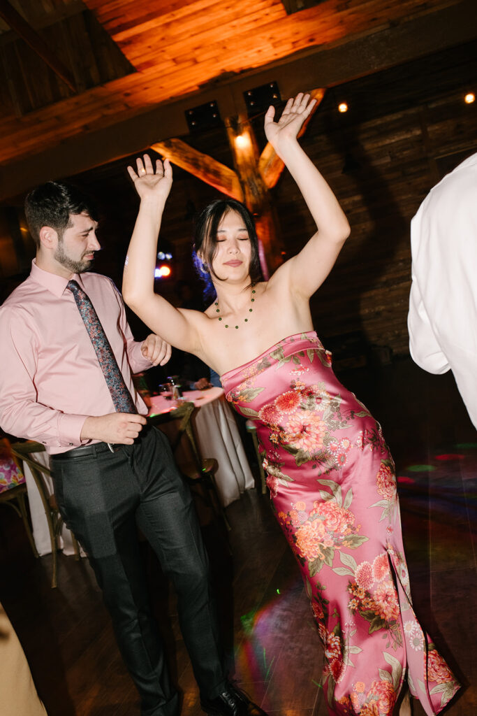 Late night dancing inside Wedgewood Mountain View Ranch’s lodge-style reception space.