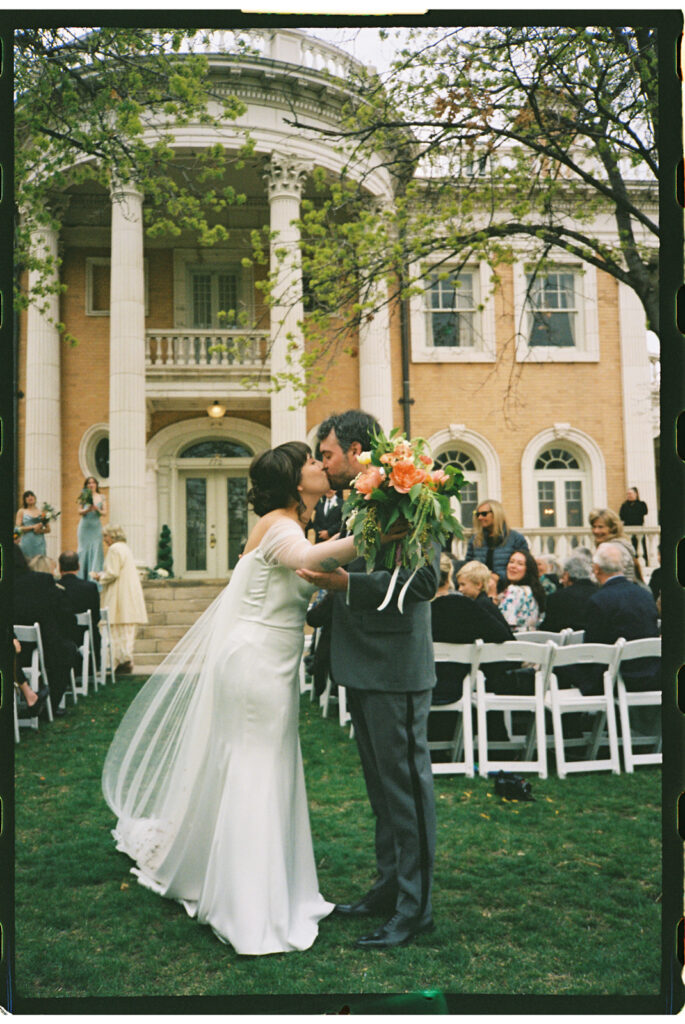 Intimate wedding ceremony outside Grant Humphreys Mansion venue
