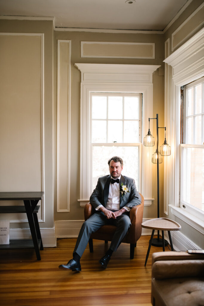 
Groom upstairs room of Grant Humphreys Mansion before wedding ceremony
