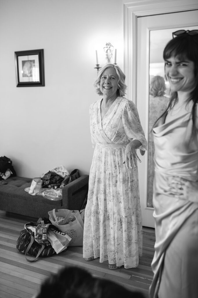 Candid photo of bride getting ready in vintage bridal suite at Grant Humphreys Mansion