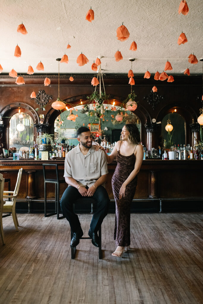 Engagement session at Fort Greene Bar with natural, documentary photography