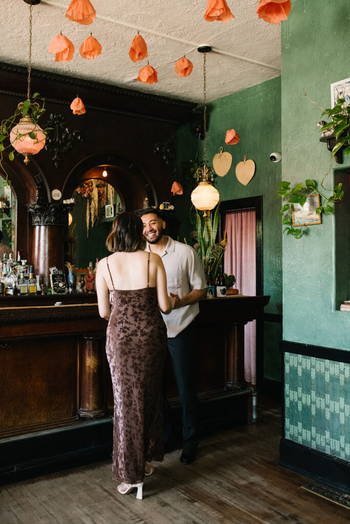 Candid moment during a Fort Greene Bar engagement session
