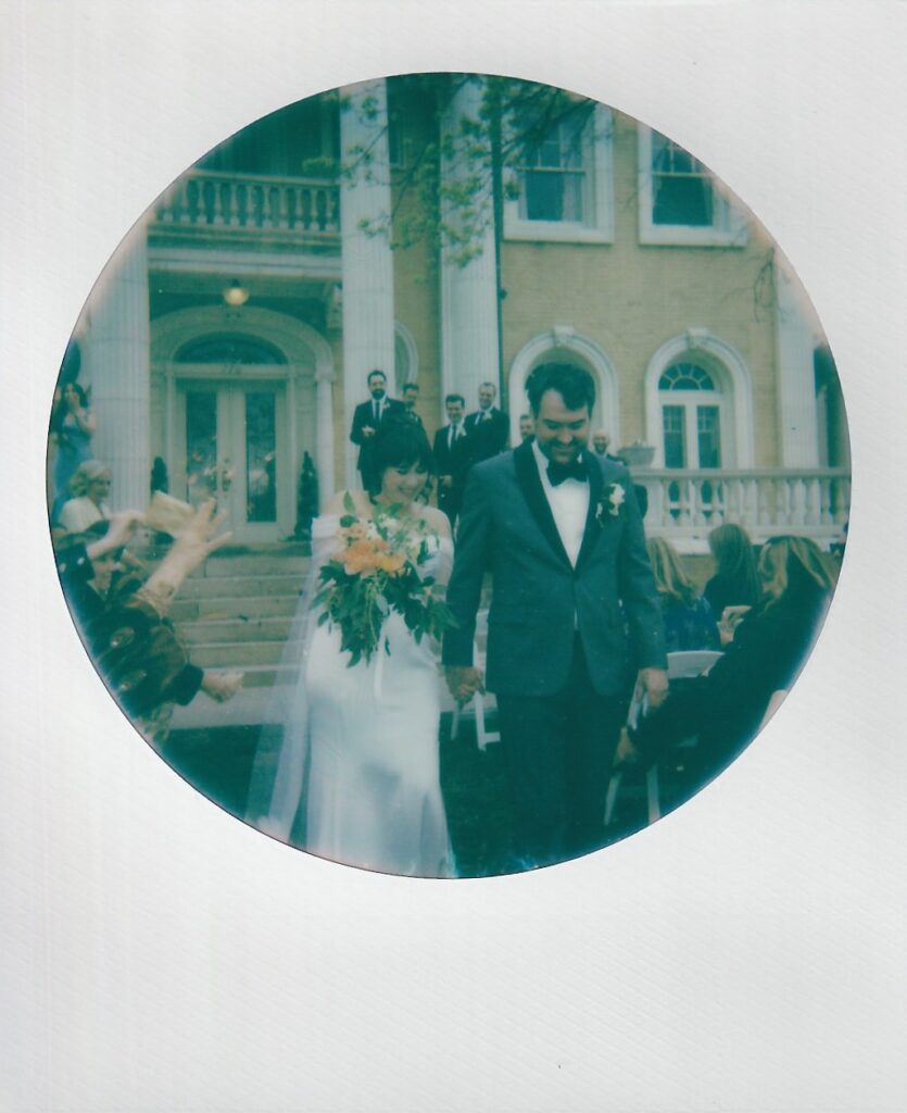 Intimate wedding ceremony outside Grant Humphreys Mansion venue
