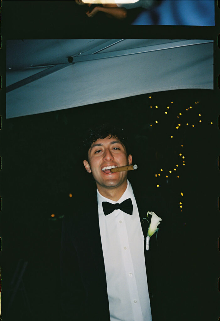 documentary and candid moment of a guest during a rainy spring wedding at the greenbriar inn wedding venue