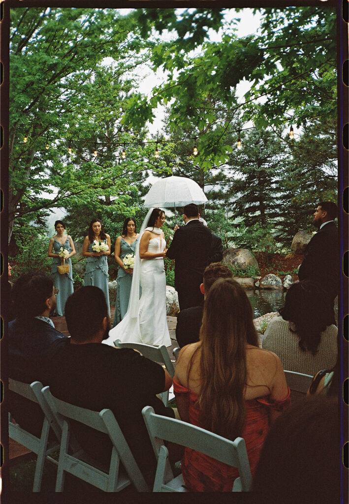 bride and groom exchanging vows during a Greenbriar Inn wedding ceremony.