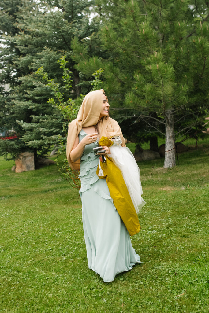 Candid photo of family laughing  during a Greenbriar Inn wedding.