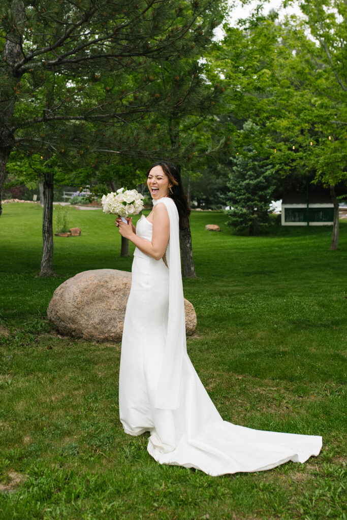 rainy portrait of the bride at their spring The Greenbriar Inn wedding.