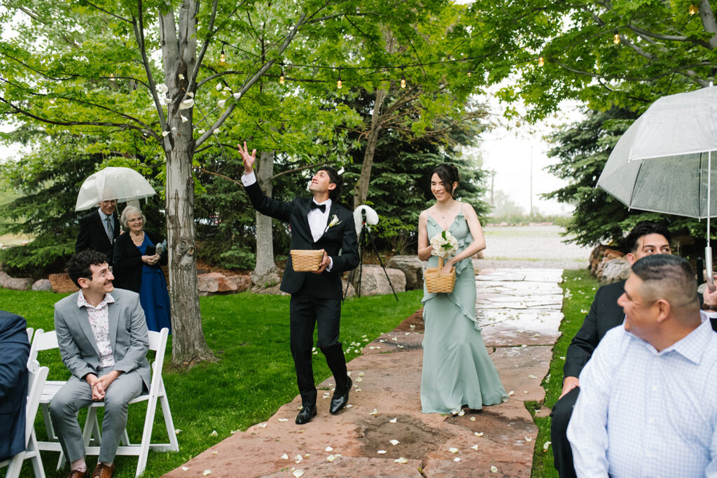 Rainy spring Greenbriar Inn wedding ceremony at Greenbriar Falls in boulder colorado