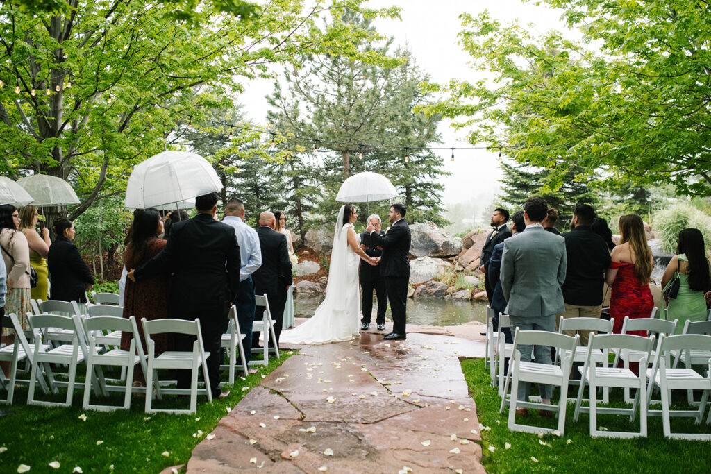 bride and groom exchanging vows during a Greenbriar Inn wedding ceremony.