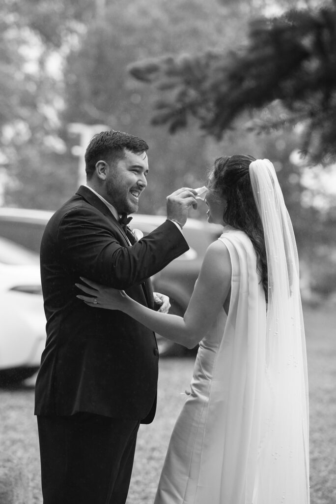 Bride and groom exchanging kisses during a Greenbriar Inn wedding ceremony.
