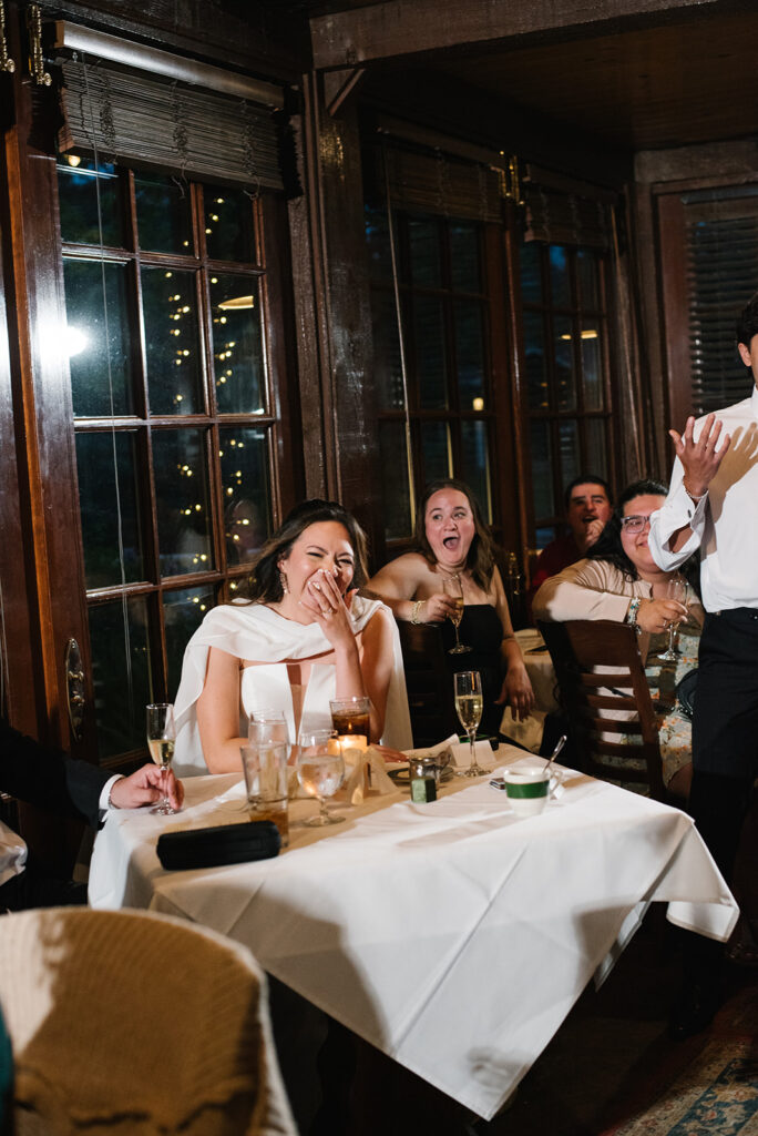 documentary and candid moment of the bride during a rainy spring wedding at the greenbriar inn wedding venue