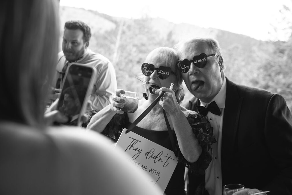 Guests mingling during cocktail hour at North Star Gatherings wedding deck.
