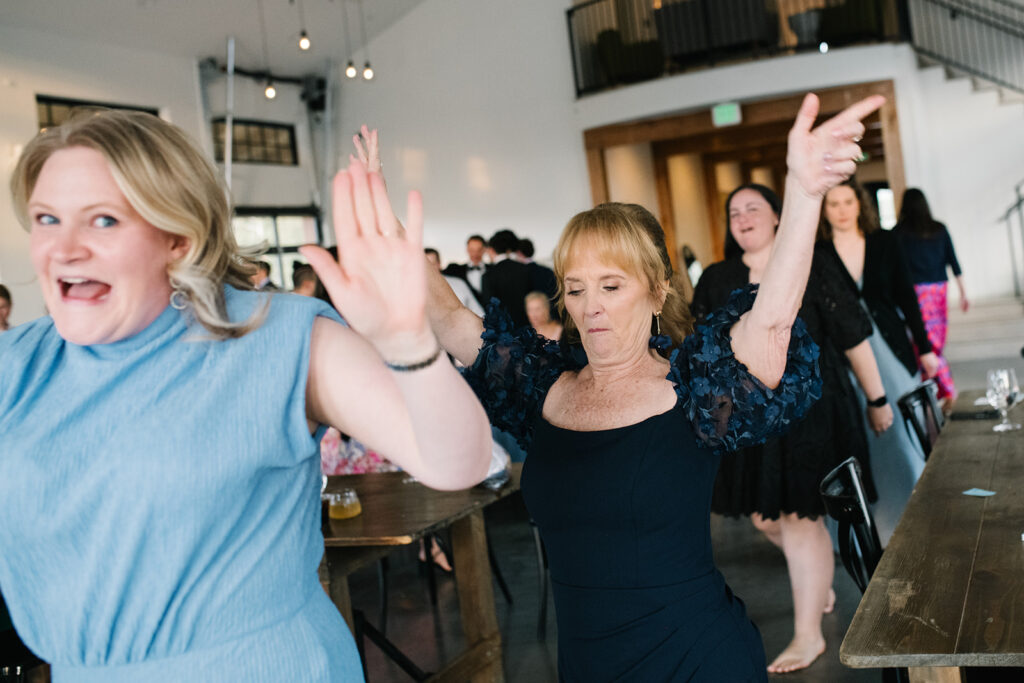candid and documentary dance floor photos at north star gathering summer wedding
