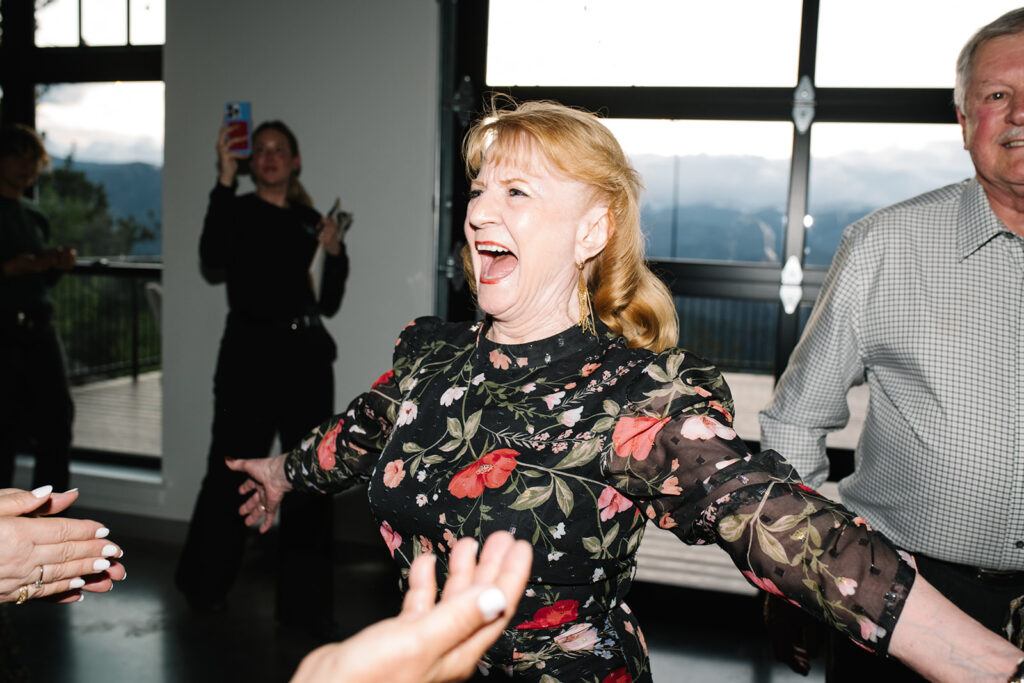 candid and documentary dance floor photos at north star gathering summer wedding