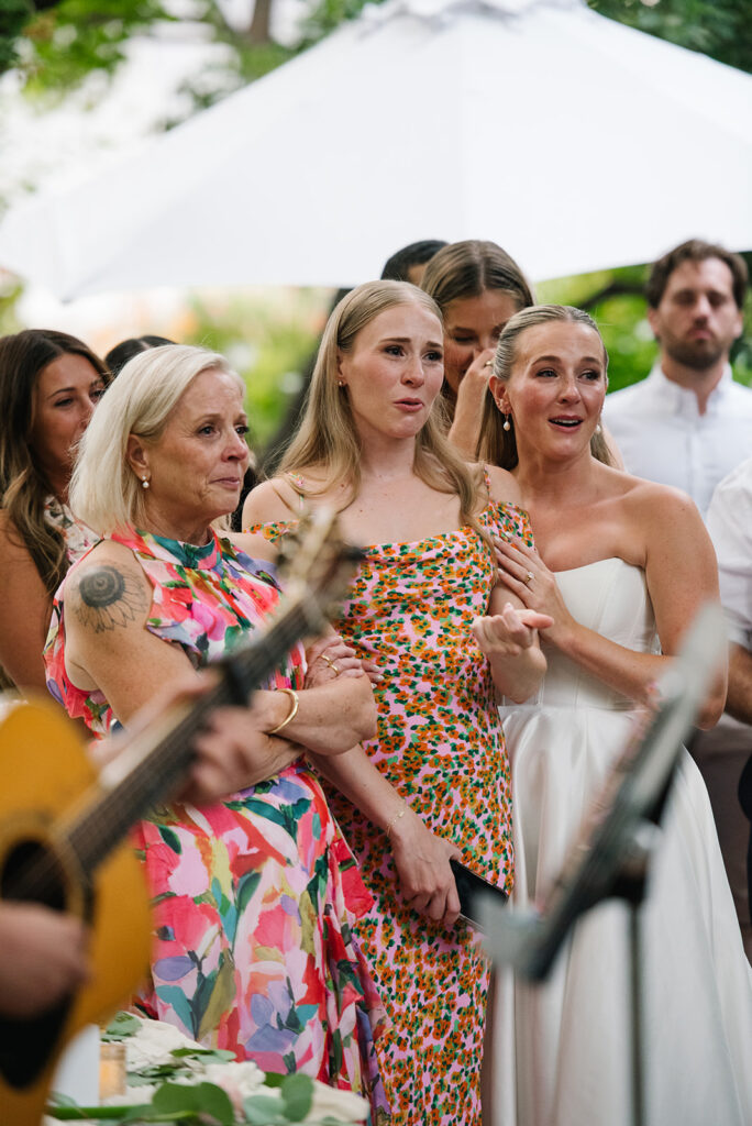candid reception moments at the Denver Botanic Gardens Wedding inside the Mosaic Solarium