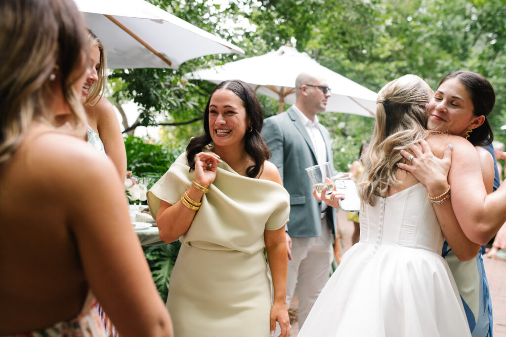documentary wedding photographs of cocktail hour at the denver botancial gardens