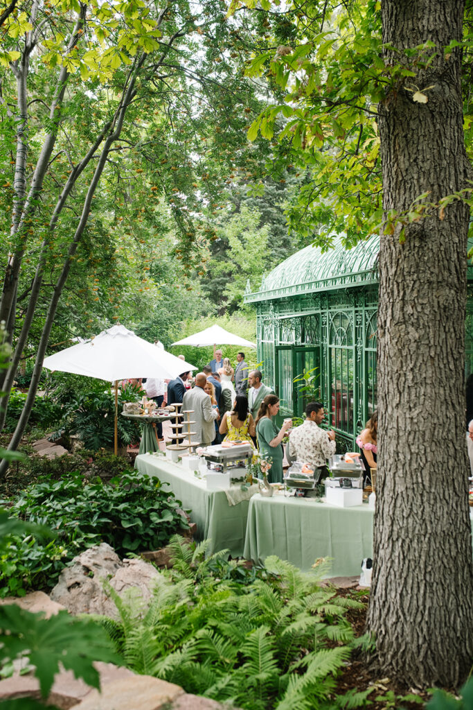 documentary wedding photographs of cocktail hour at the denver botancial gardens